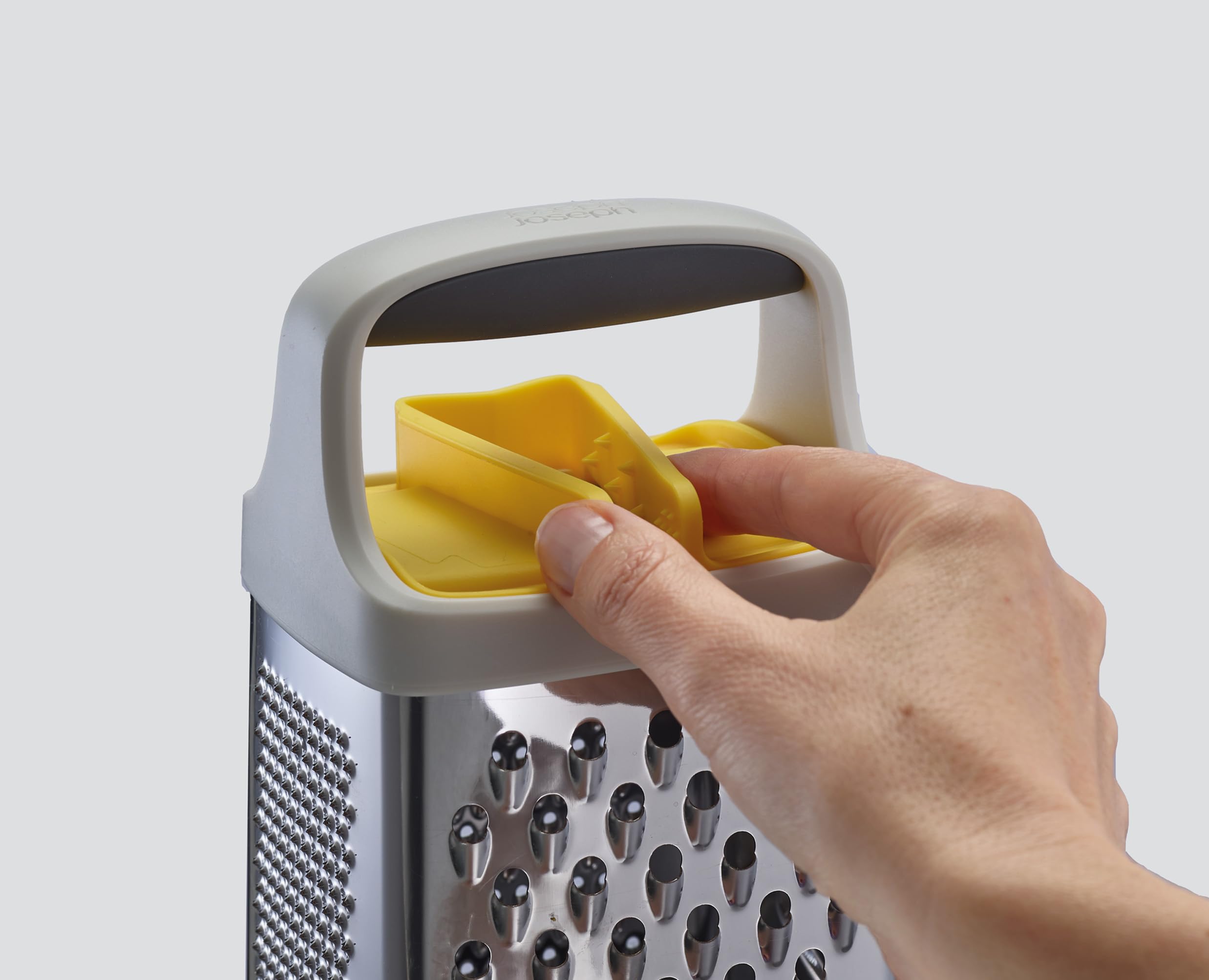 joseph-joseph-multi-grip-grattugia-mandolina-4-lati-in-acciaio-inox-con-contenit image 3